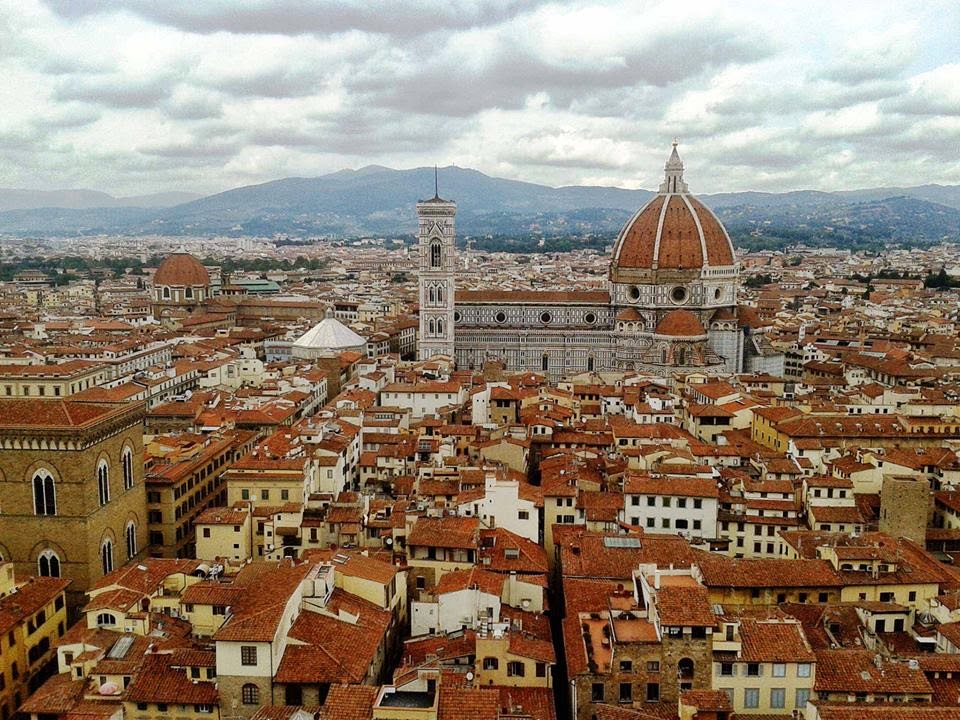 panorama from the tower of palazzo vecchio with the cathedral and the red rooftops