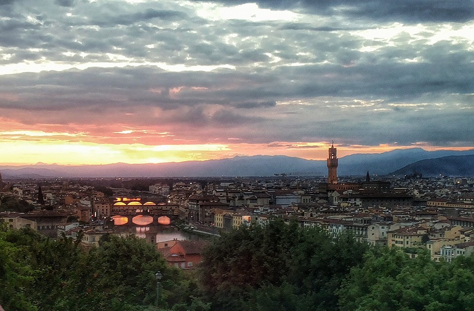 sunset on the city of florence, the arno river and the bridges, seen from piazzale michelangelo