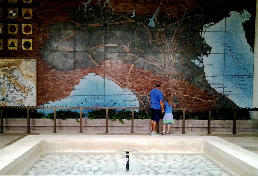 father and daughter looking at a map of the IIWW in the memorial