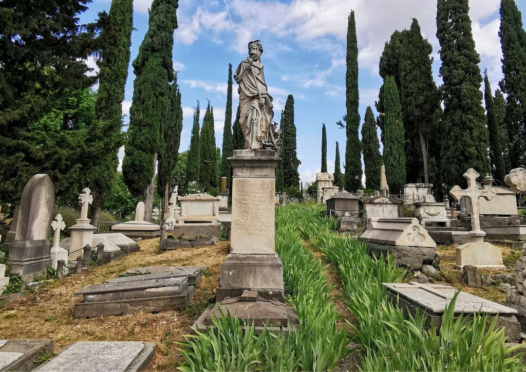 the grim reaper statue at the english Cemetery of Florence