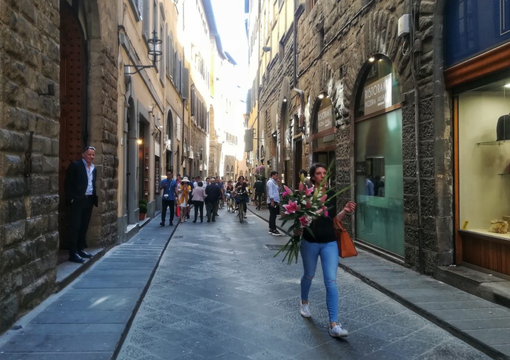 people walking in the historic centre