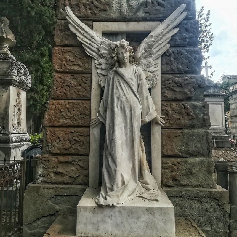 Angel statue in a private tomb at monumental cemetery of Florence