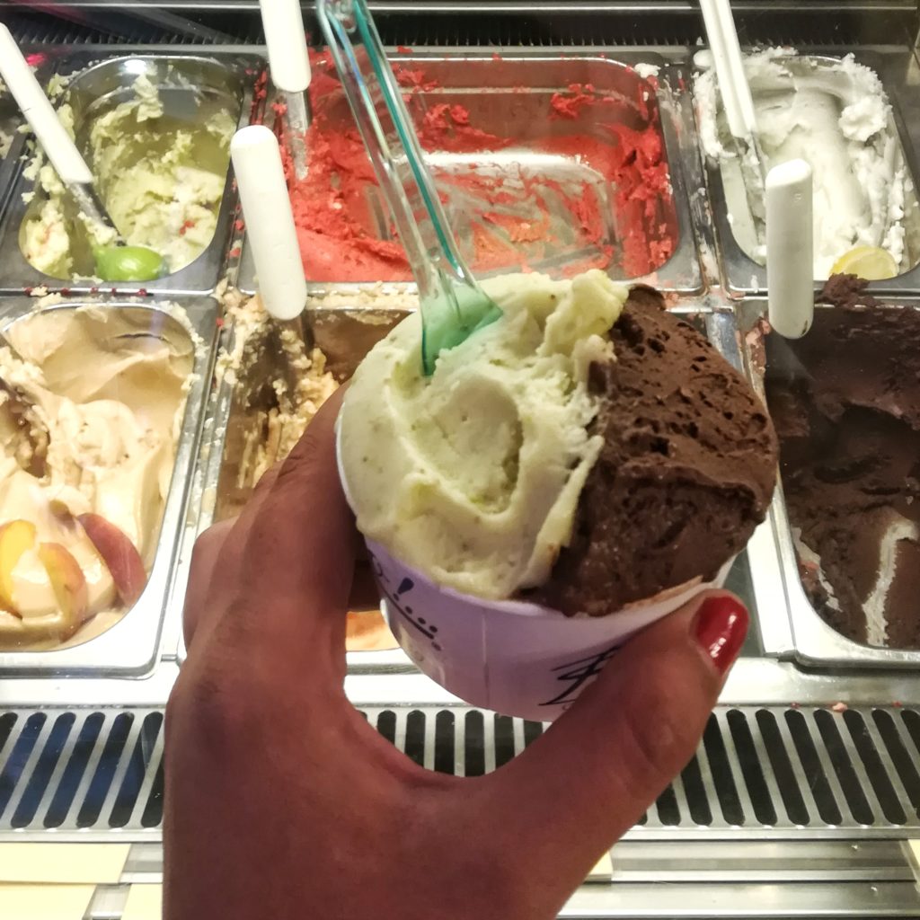 cup of gelato and different flavors