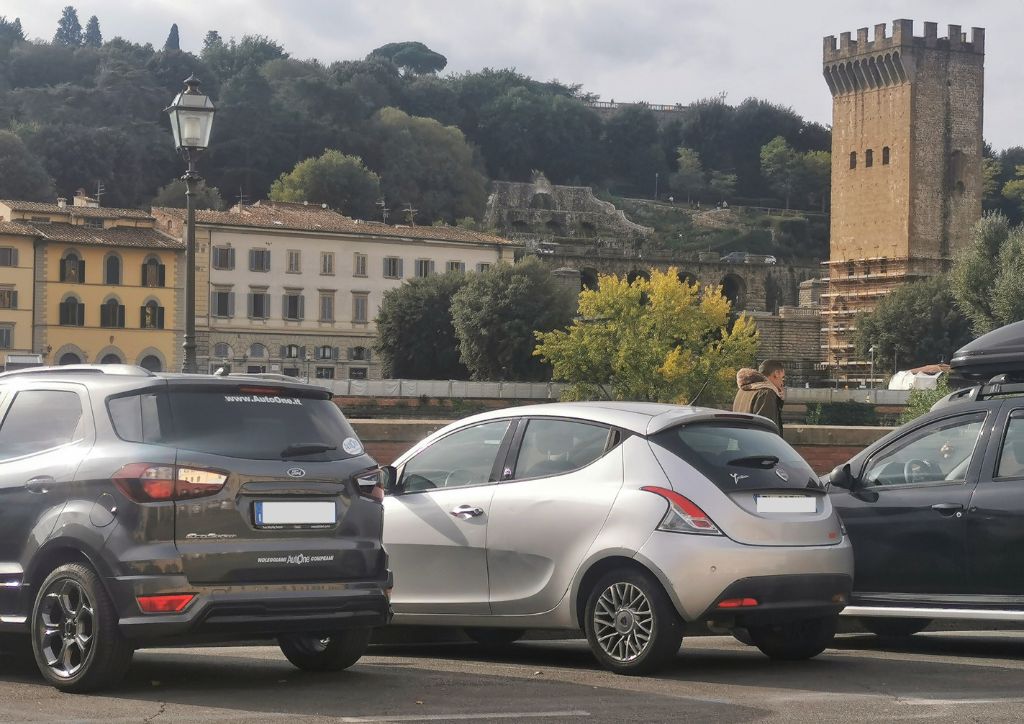 rental cars parked in Florence, italy