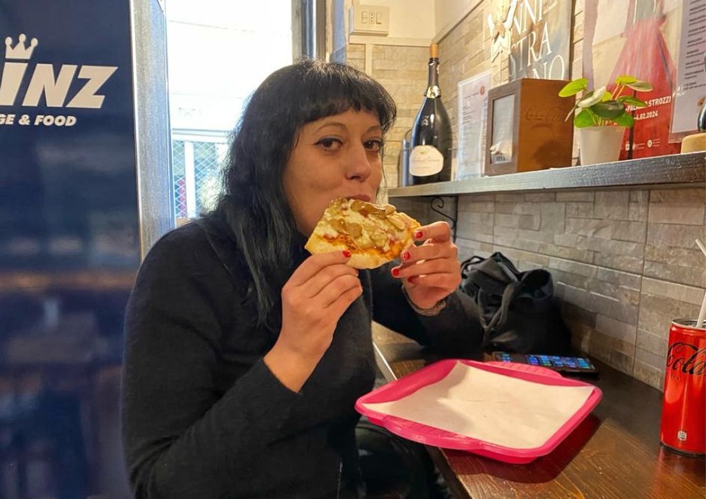 me eating one the best pizza in Florence, Italy