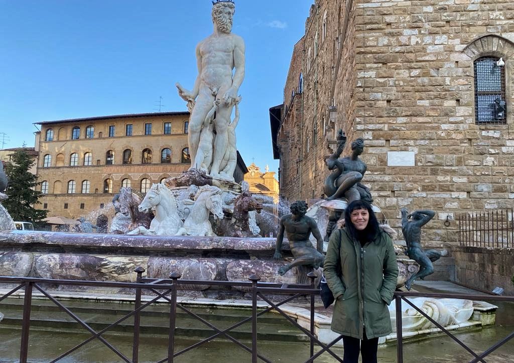 me and the fountain of neptune in piazza della signoria, one of the most beautiful of Florence, italy